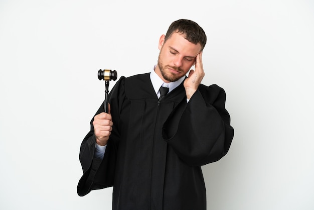 Judge caucasian man isolated on white background with headache