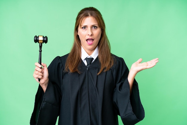 Photo judge caucasian woman over isolated background with shocked facial expression
