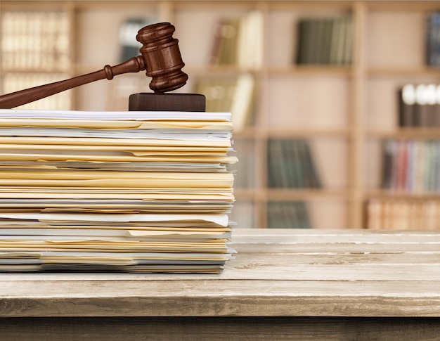 Judge gavel and documents, close-up view