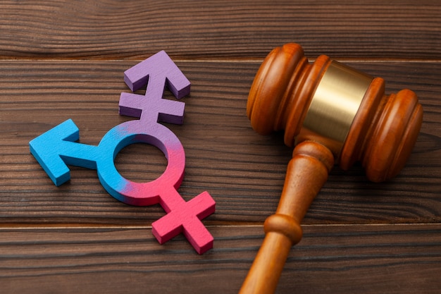 Judge gavel and gender symbol of transgender.