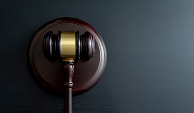 Judge gavel on wooden table