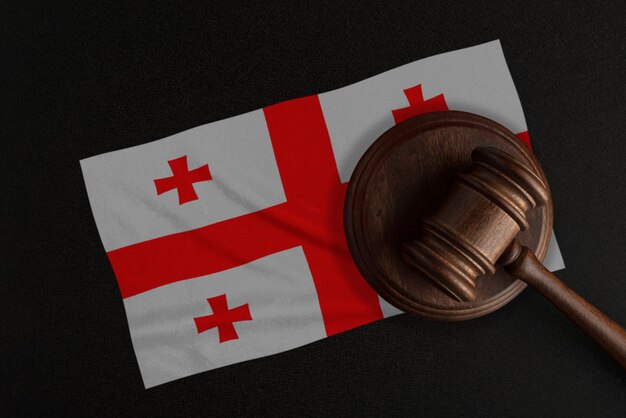 Judges gavel and the flag of georgia. law and justice. constitutional law.