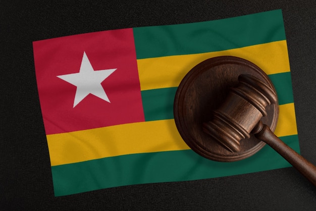 Judges hammer and the flag of Togo. Law and Justice. Constitutional law