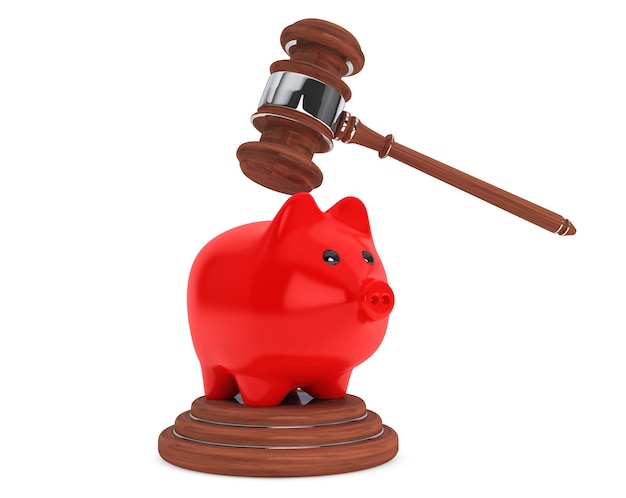 Judicial gavel and piggy bank on a white background