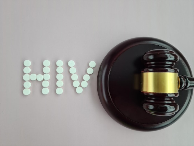 Photo judicial gavel and text hiv aids and judgment