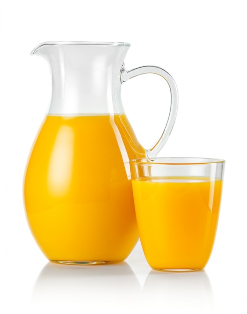 Photo jug and glass with orange juice isolated on white