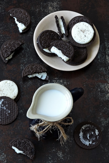 jug of milk and chocolate milk cookies.