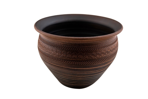 Jug with red clay isolated on a white background, typical handicrafts