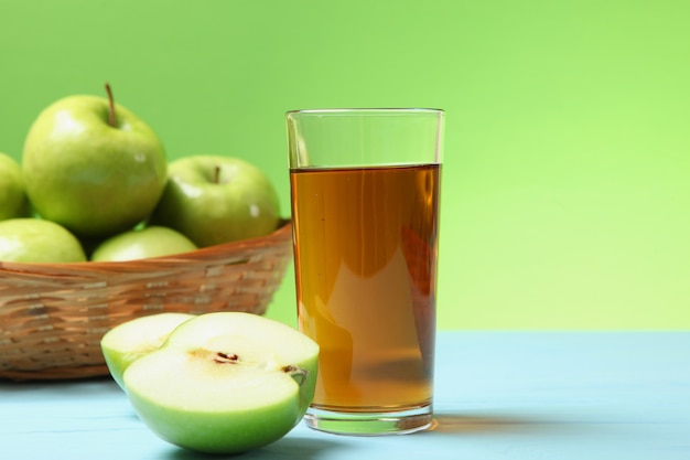 Juice from green apples on the table