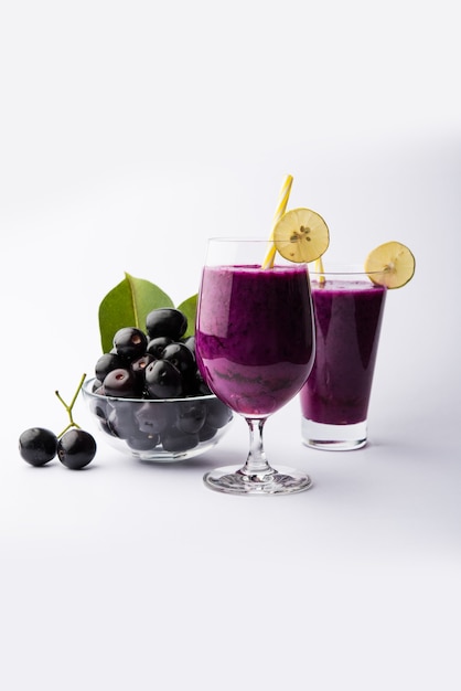 Juice of jamun fruit in a glass also called as java plum, jambolan plum, jambhul, syzygium cumini