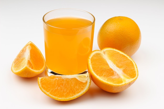 Juice and orange on a white