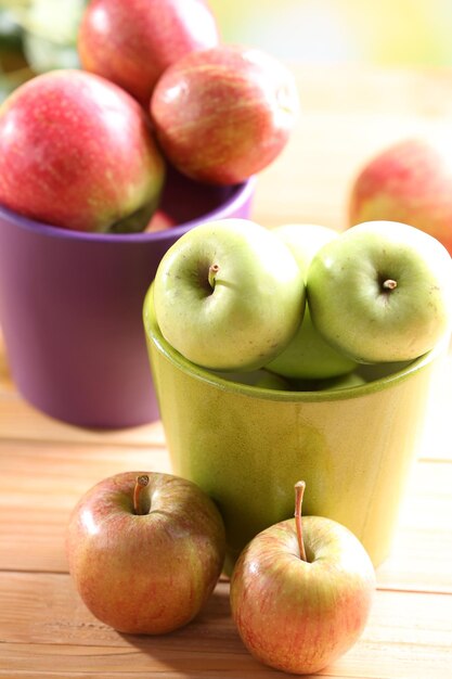 Juicy apples in pots closeup