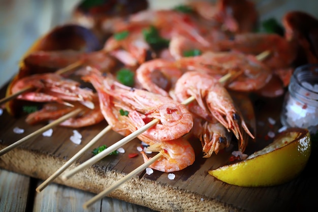 Juicy BBQ shrimp with spices and lemon