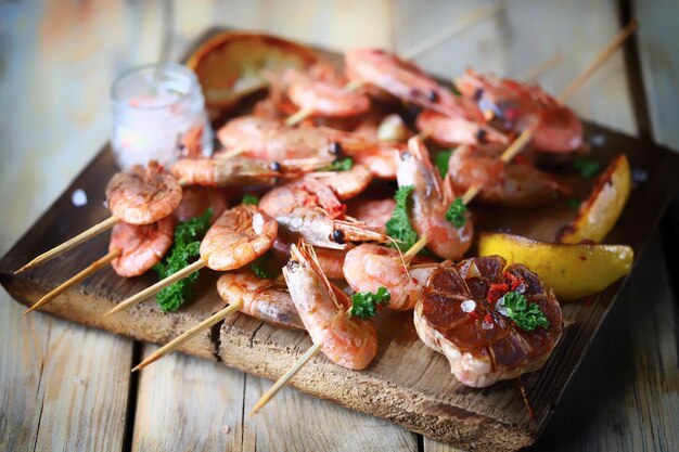 Juicy BBQ shrimp with spices and lemon