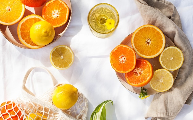 Juicy citrus fruits on white