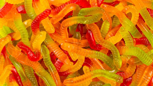 Photo juicy colorful jelly sweets gummy candies snakes