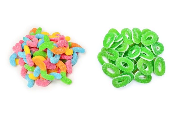 Juicy colorful jelly sweets isolated on white. Gummy candies. Snakes.