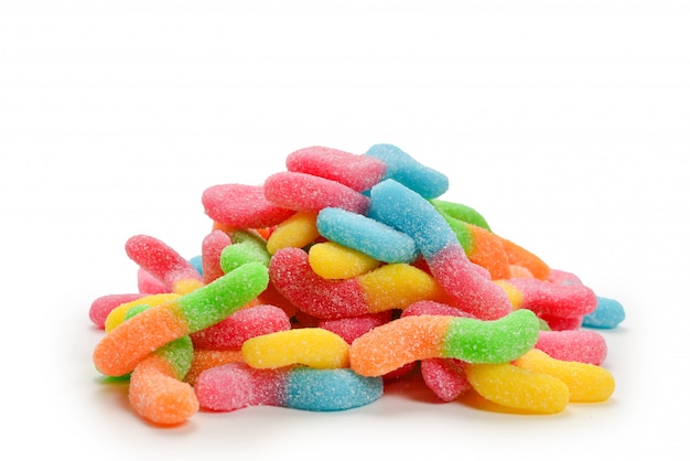 Juicy colorful jelly sweets isolated on white. Gummy candies. Snakes.