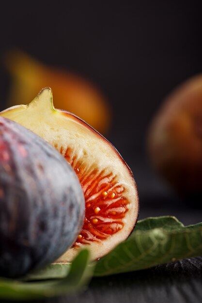 Juicy figs on a dark background