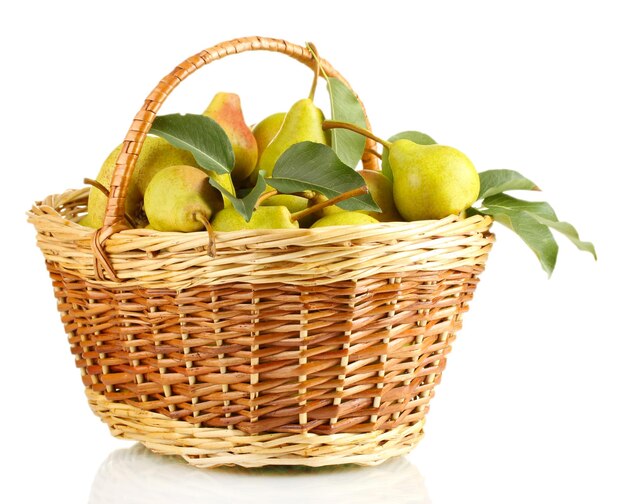 Juicy flavorful pears in basket isolated on white