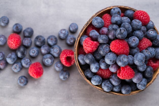 Juicy and fresh blueberries on rustic gray table