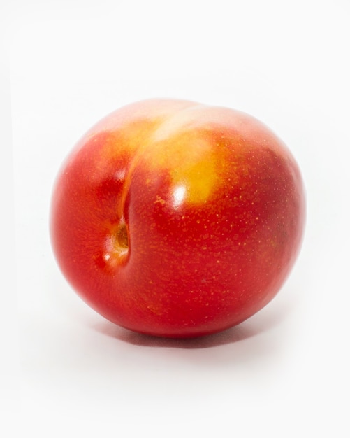 Juicy, fresh, red plum, isolated