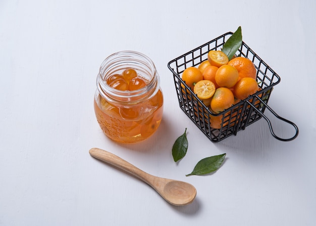 Juicy fresh sweet kumquats in a metal box