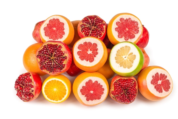 Juicy grapefruit, orange, pomegranate, citrus sweetie on white background.