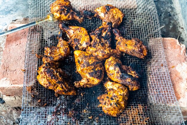 Juicy grilled chicken drumsticks BBQ Chicken on Grill Chicken bbq cooked in home with traditional style