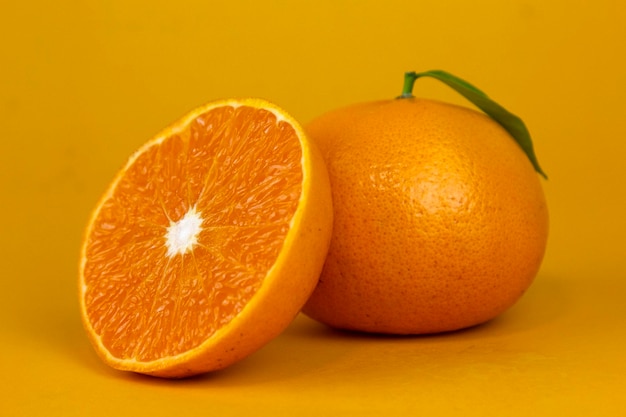 Juicy Orange fruit with leaf isolated and Orang whole slice leaves on white Orange slice