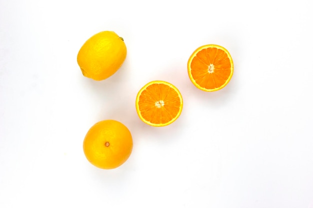 Juicy Oranges slice and arranged on white background used for orange juice and healthy fruit concept