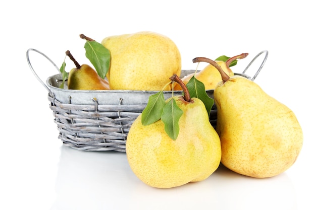 Juicy pears in wicker basket isolated on white