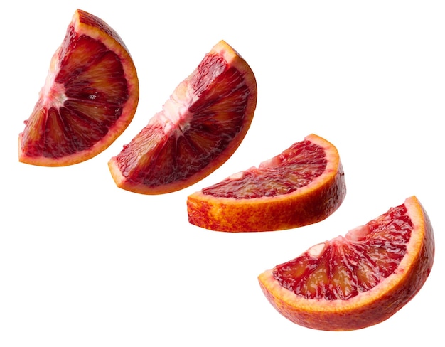 Juicy piece of red orange on a white isolated background