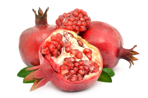 Juicy pomegranate on white surface