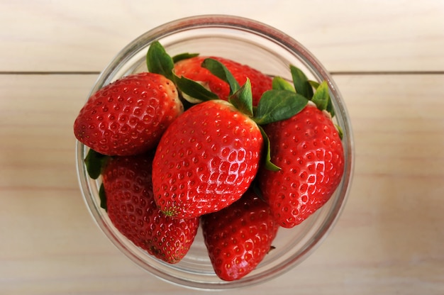 Juicy red strawberries on a plate