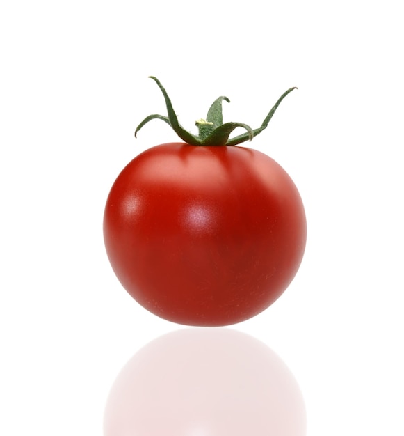 Juicy red tomato on the isolated background