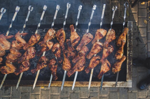 Juicy slices of meat prepare on fire shish kebab