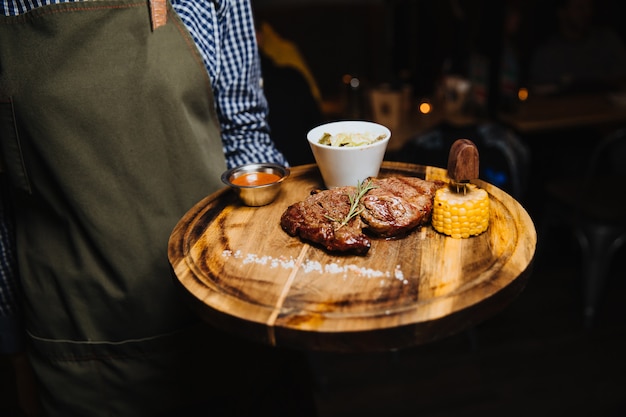 Juicy steak of meat, grilled with vegetables