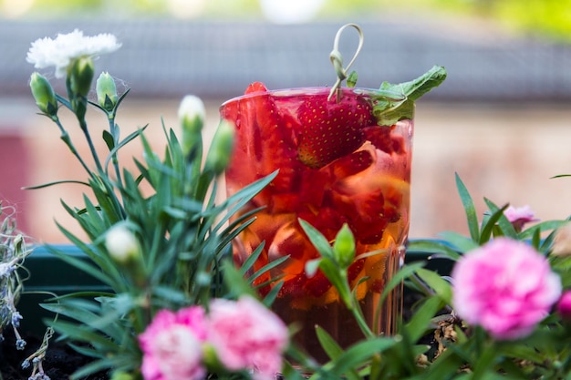 Juicy strawberry with apple and mint with ice A fresh summer nonalcoholic fruit and berry cocktail