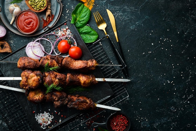 Juicy tasty pork kebab. Skewers. Barbecue menu. Top view. Free copy space.