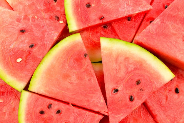 Juicy watermelon slices background Top view