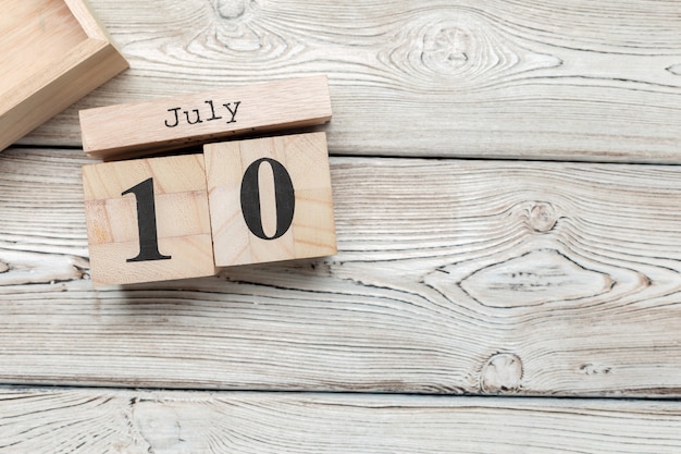 July 10th. Image of july 10, calendar on wooden . Summer time