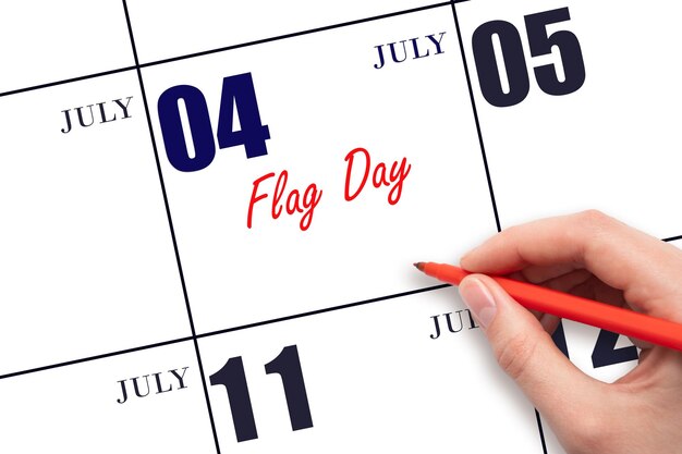 july hand writing text flag day on calendar date save the date holiday important date day of the