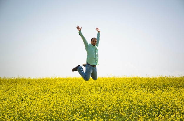 Jumping Happy Young Man