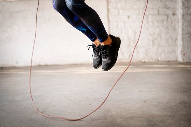 Jumping skipping rope at gym