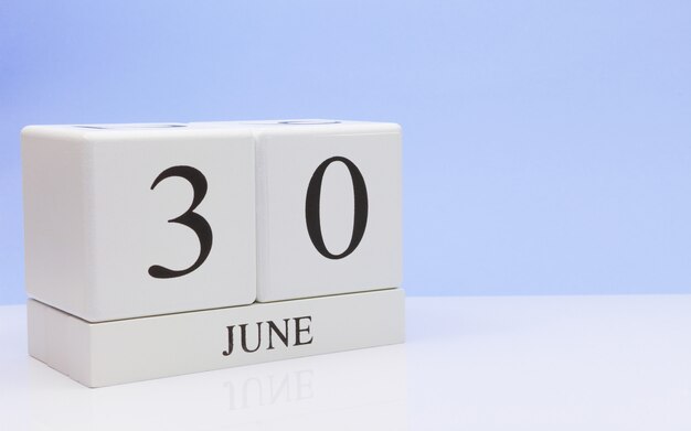 June 30st. Day 30 of month, daily calendar on white table