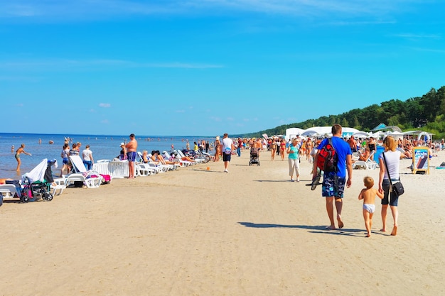 Jurmala, Latvia - August 18, 2013: People at the Baltic sea in Jurmala, Latvia recreational resort