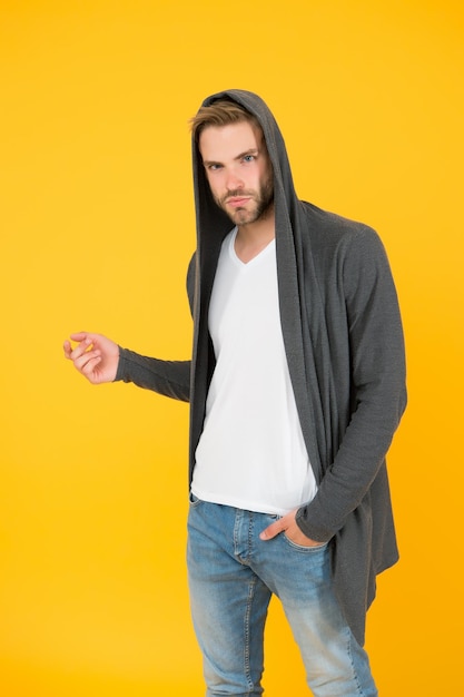 Just hang out Comfy garment for daily life Fashion man yellow background Fashion look Handsome guy wear fashionable mantle with hood Casual menswear Fashion trends Modern clothes for youth