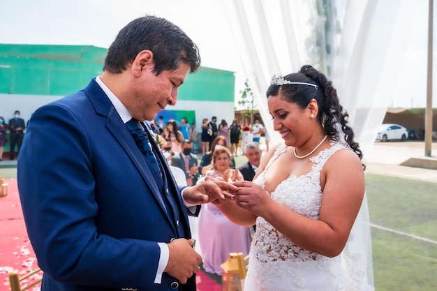 Just married 40yearold couple wife puts a ring on her husband