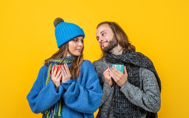 Just perfect morning couple in love spend winter holidays cold season vacation and activity christmas fun knitted fashion man and woman in sweater hat and scarf happy family wear warm clothes